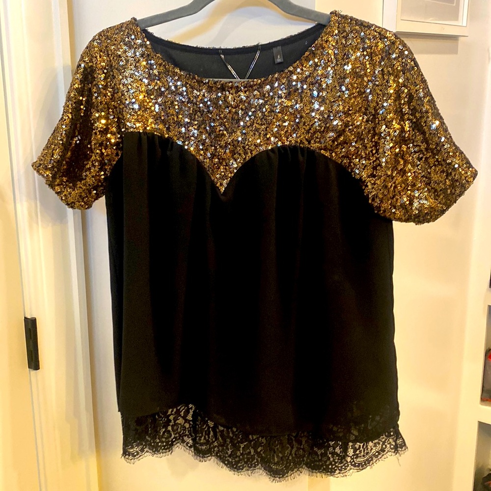 Gold sequins and black lace top